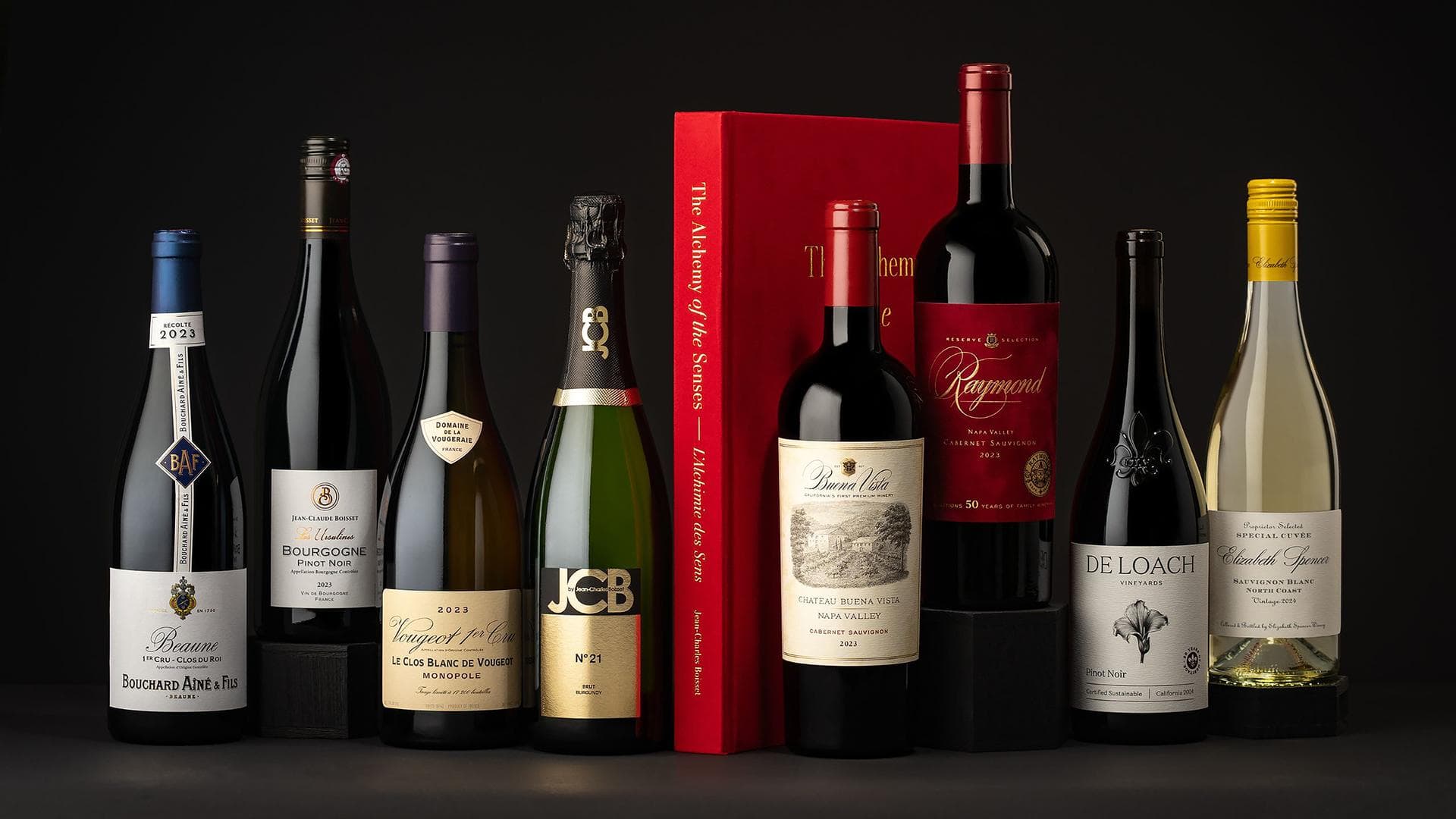 The Boisset Collection portfolio, seven estate bottles on a candlelit table